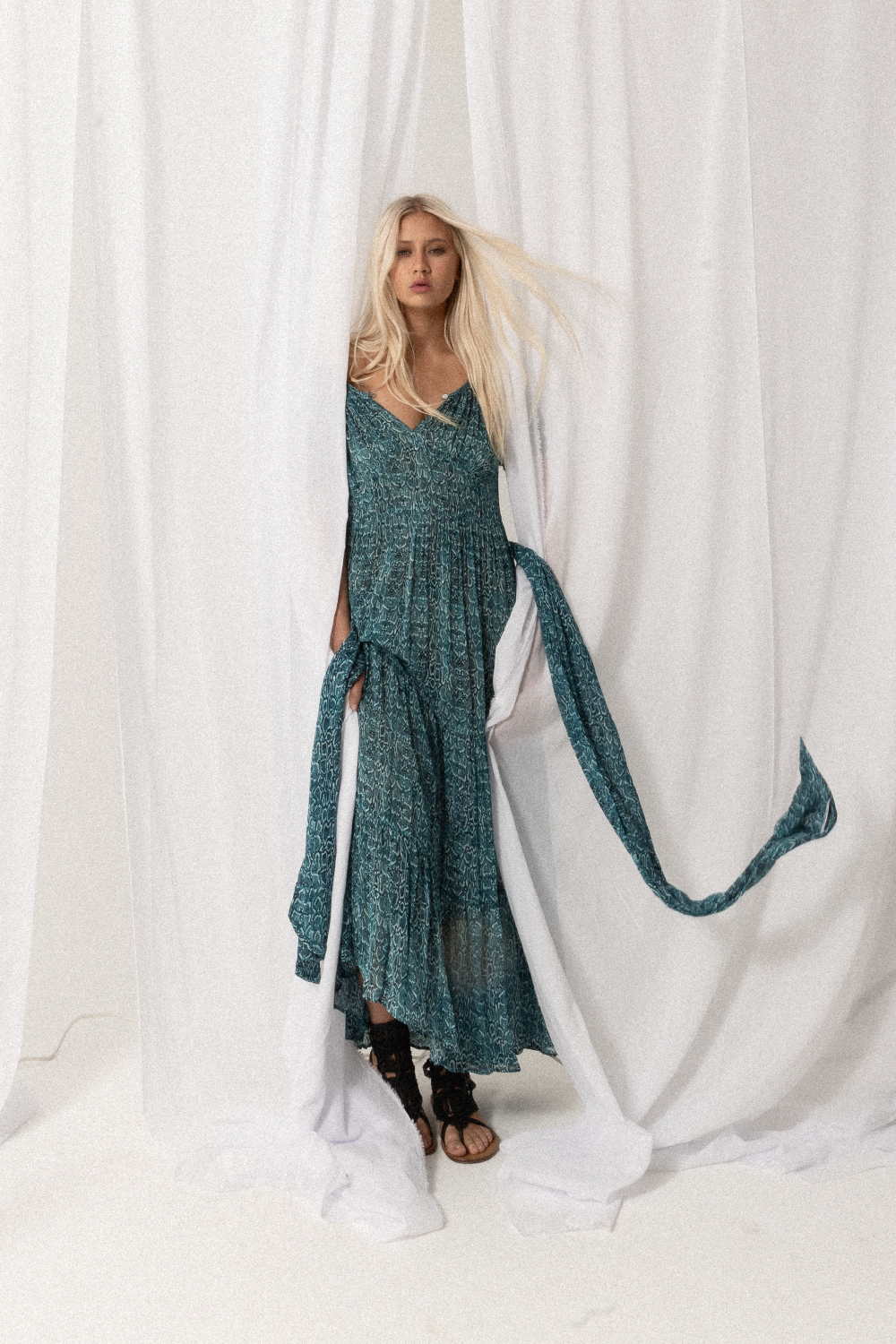 Dress with short puff sleeves, layered ruffles and a single button scoop neck. - Joey The Label