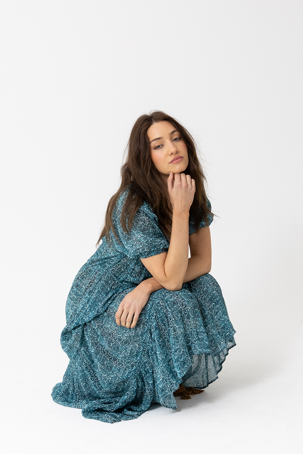 Dress with short puff sleeves, layered ruffles and a single button scoop neck. - Joey The Label