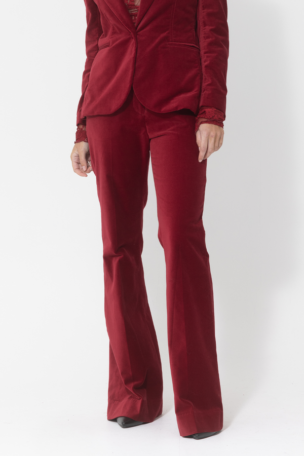 ruby red velvet bootleg trousers