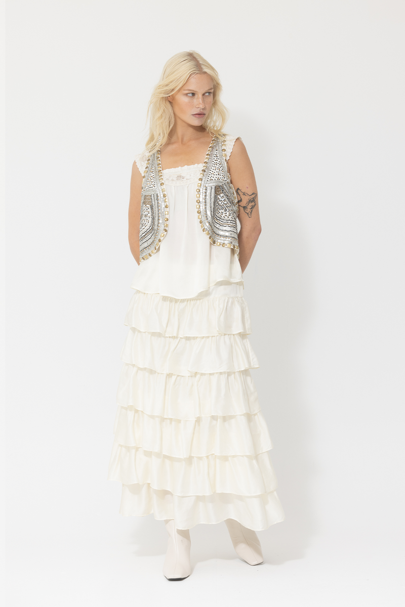 white outfit ruffle maxi skirt top sequin vest