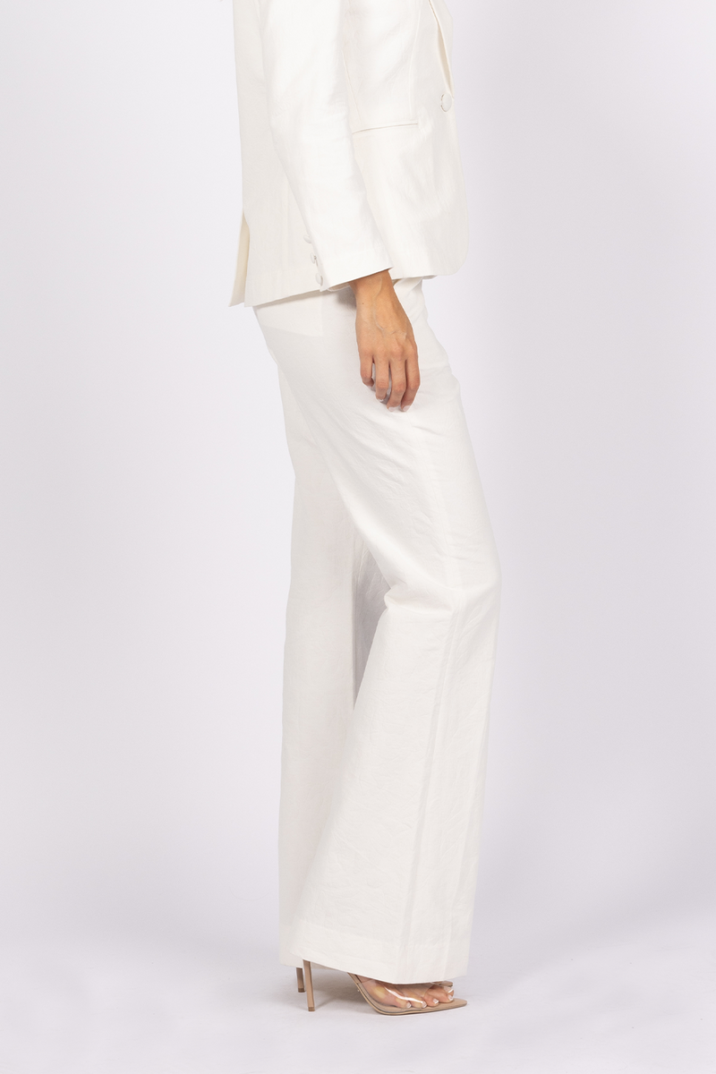 white textured jacquard print pants